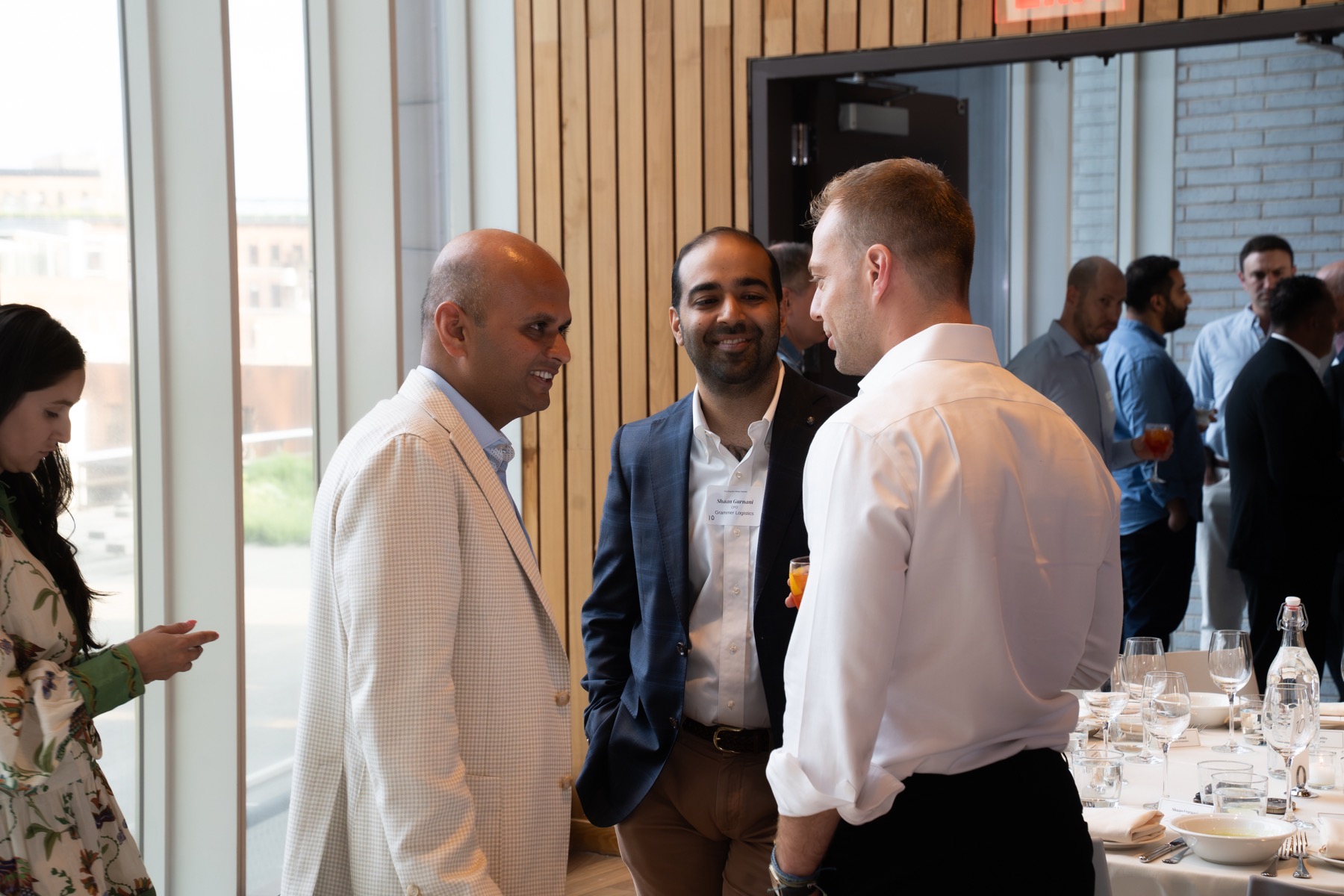 Guests networking at a corporate hospitality event