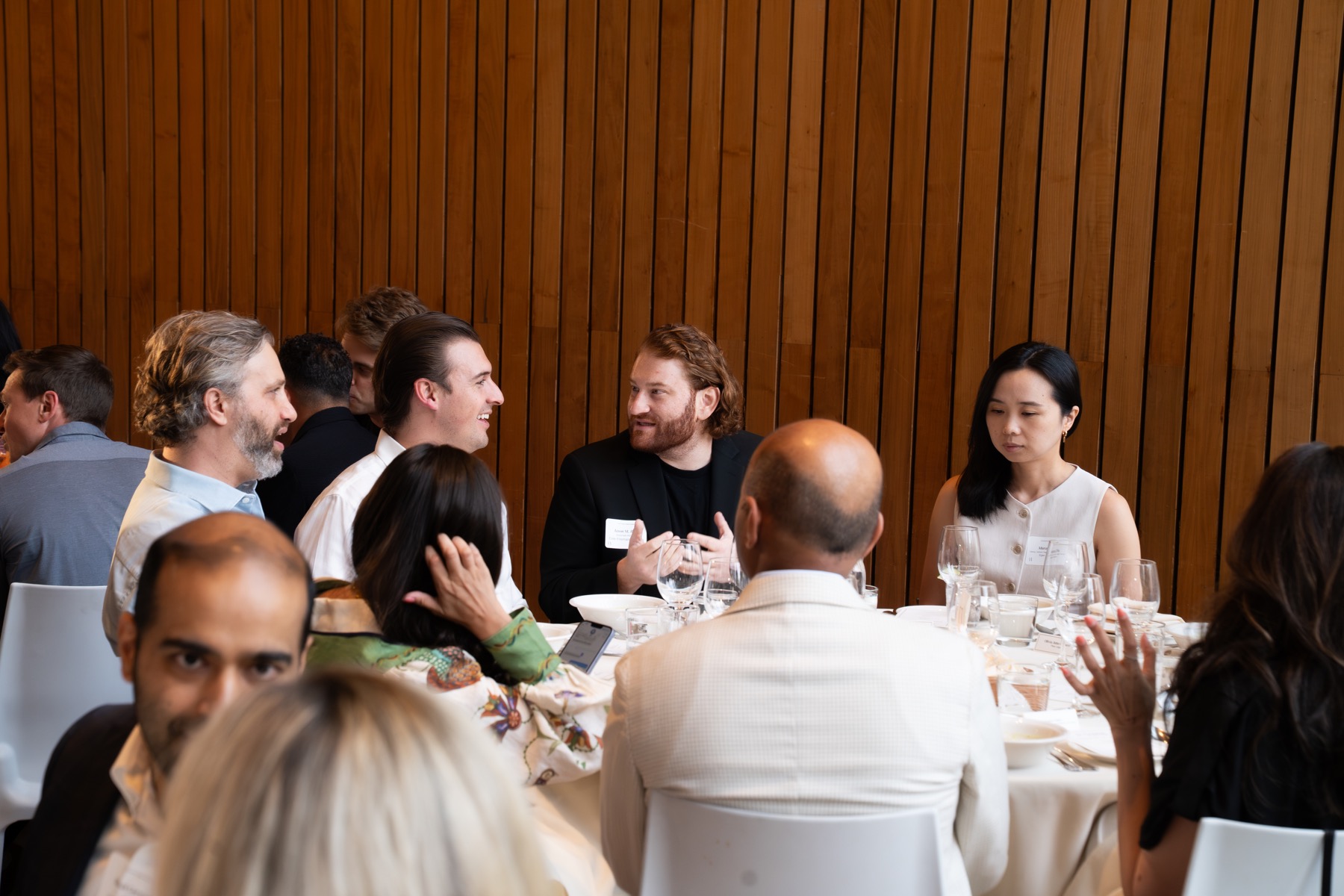 Roundtable conversation during a private corporate dinner