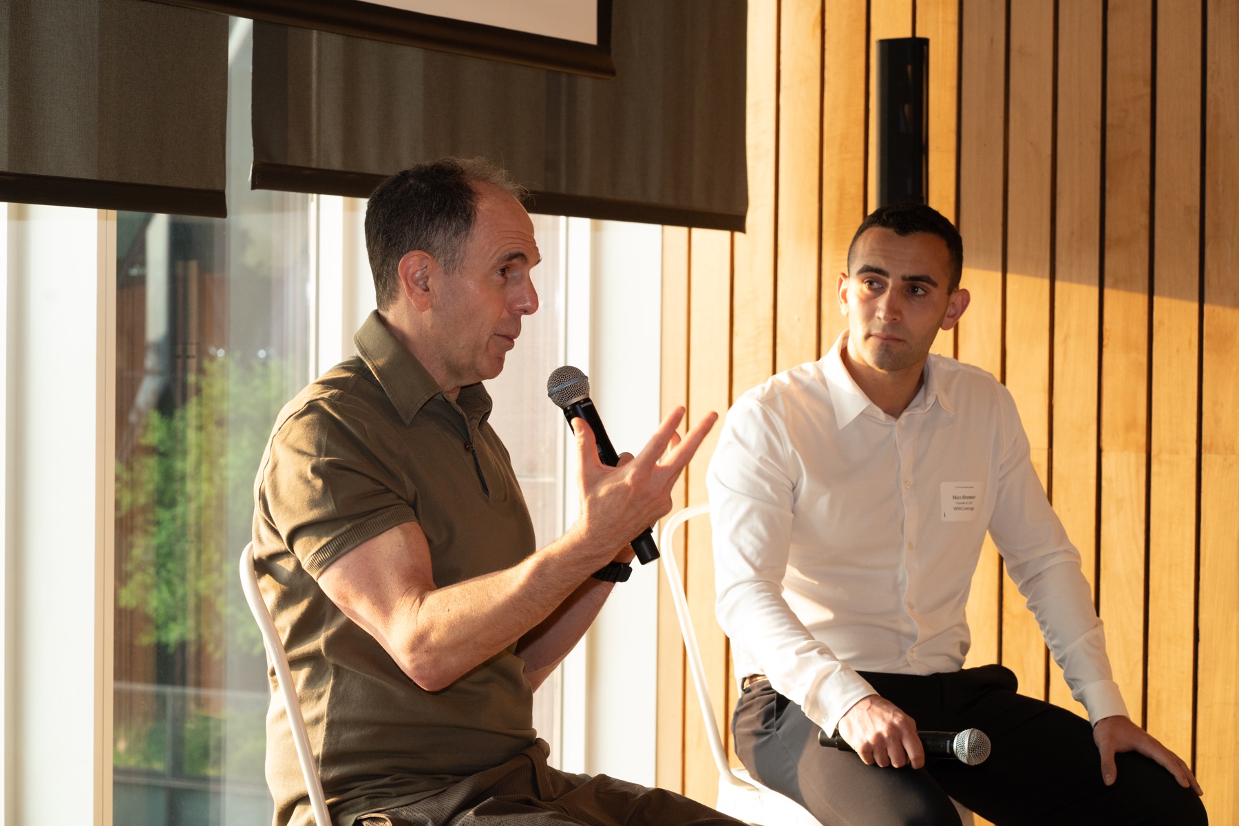 Panel speaker addressing an audience